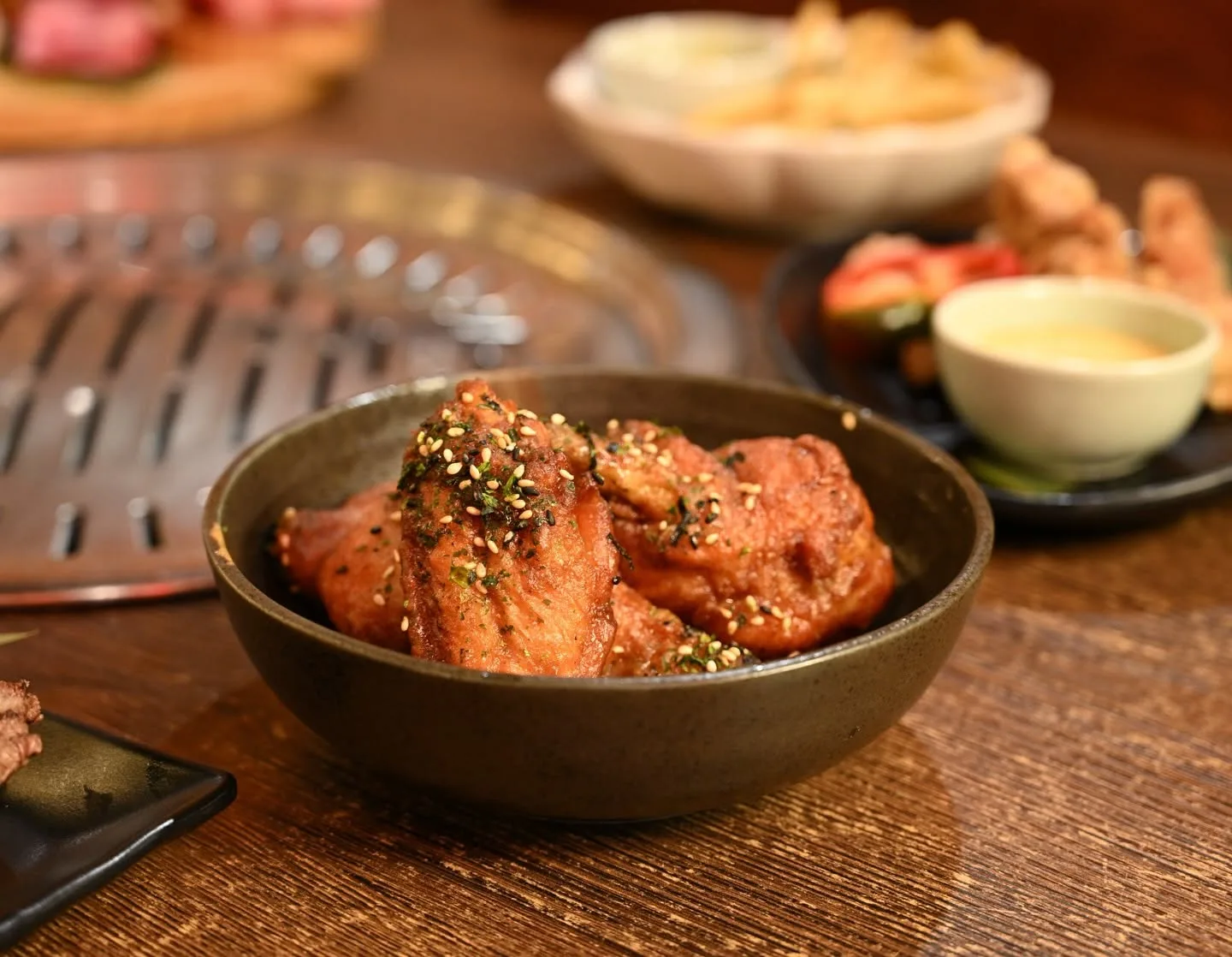 Glazed Japanese fried chicken in a stone bowl